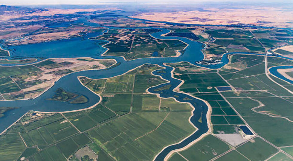 Numerous waterways snake through the delta where the Sacramento River and San Joaquin River meet.  Visible in the photo is Bethel Island, Franks Tract State Recreation Area, Mandeville Tip County Park, and Brannan Island State Recreation Area.